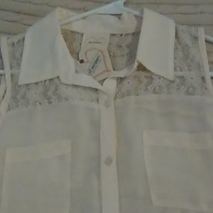 Brand Self Esteem new blouse with tags. Size large. Very light rose color.